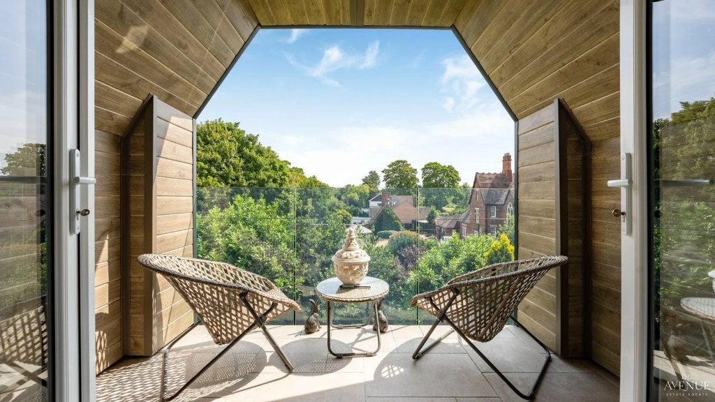 Stunning balcony loft conversion with dormer glass balcony doors by Hallam Headway